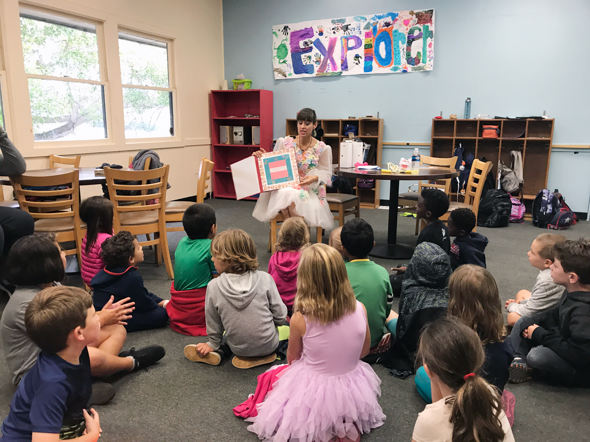 Kristen teaching kids at school about teeth